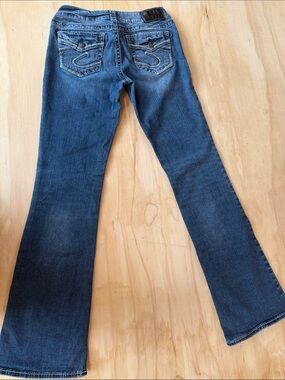 Silver Jeans Blue Boot Cut Denim with Embroidered Back Pockets